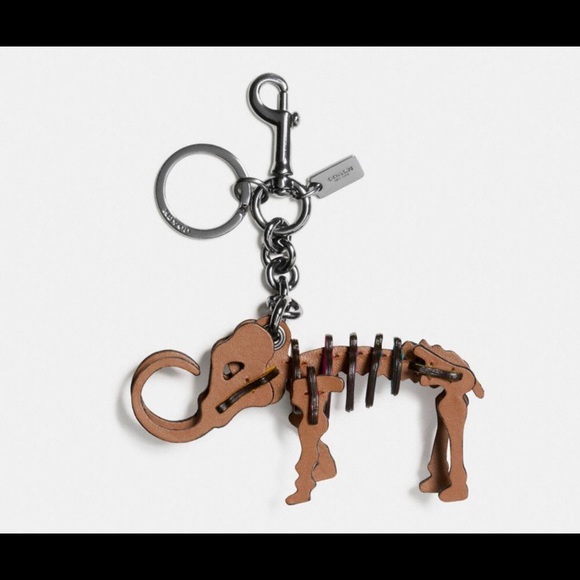 Coach Handbags - ISO Small Coach Woolly Woolly Mammoth Dinosaur Rexy Puzzle Bag Charm Keychain